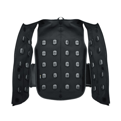 VR player wearing haptic vest open in multiplayer VR arcade